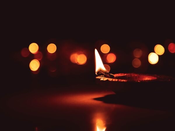 Lit diya lamp bokeh glow