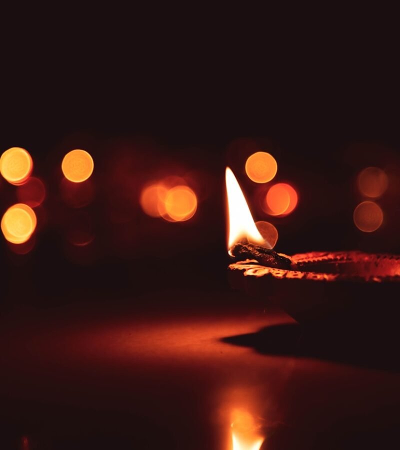 Lit diya lamp bokeh glow