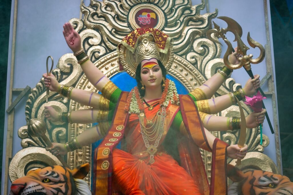 Durga goddess statue in red and gold