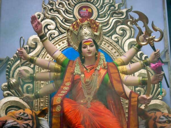 Durga goddess statue in red and gold