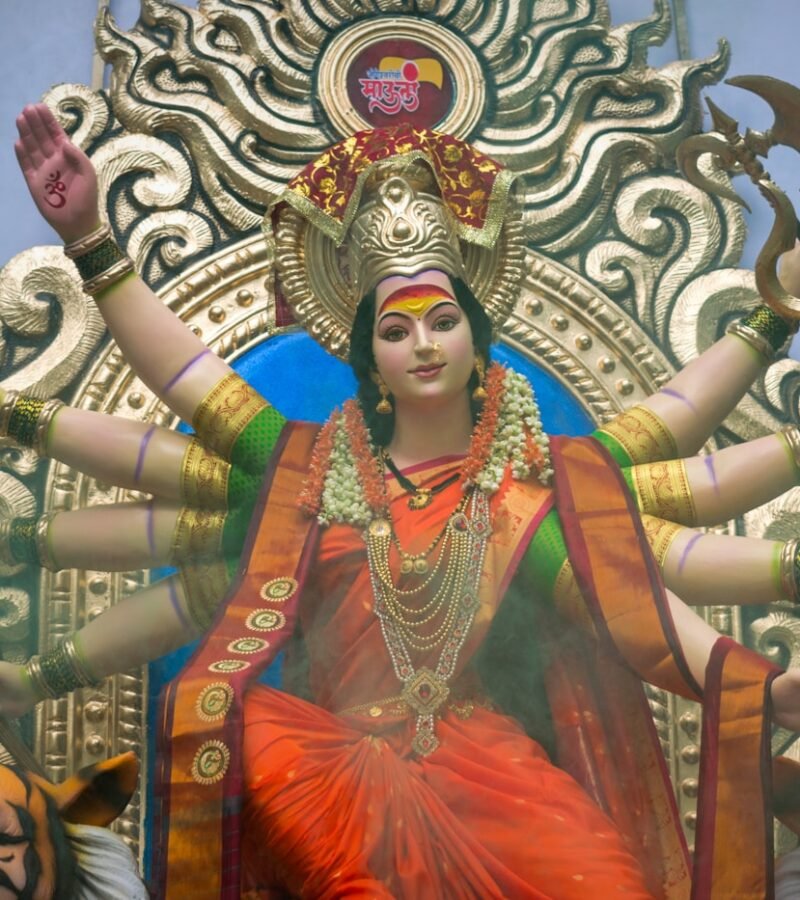 Durga goddess statue in red and gold