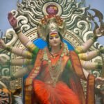 Durga goddess statue in red and gold