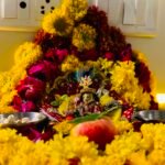 Decorated temple murti with flowers