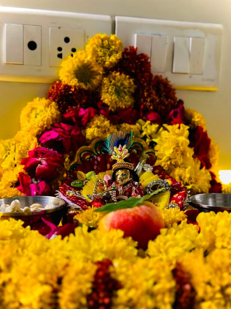 Decorated temple murti with flowers