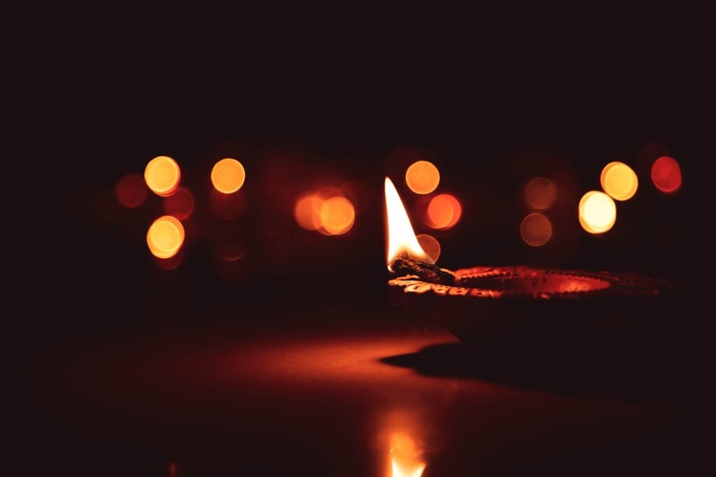 Lit diya lamp bokeh glow