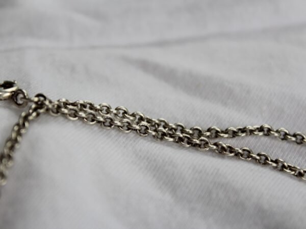 Silver chain decorative showpiece